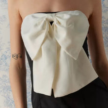 Load image into Gallery viewer, NWT Urban Outfitters Kimchi Blue Emmery Bow Strapless Mini Dress (Medium)
